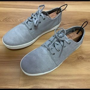 Tom’s gray suede shoes